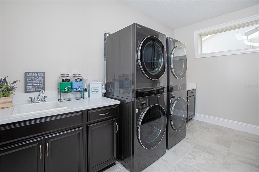 Laundry Room with Sink and Built In Cabinetry