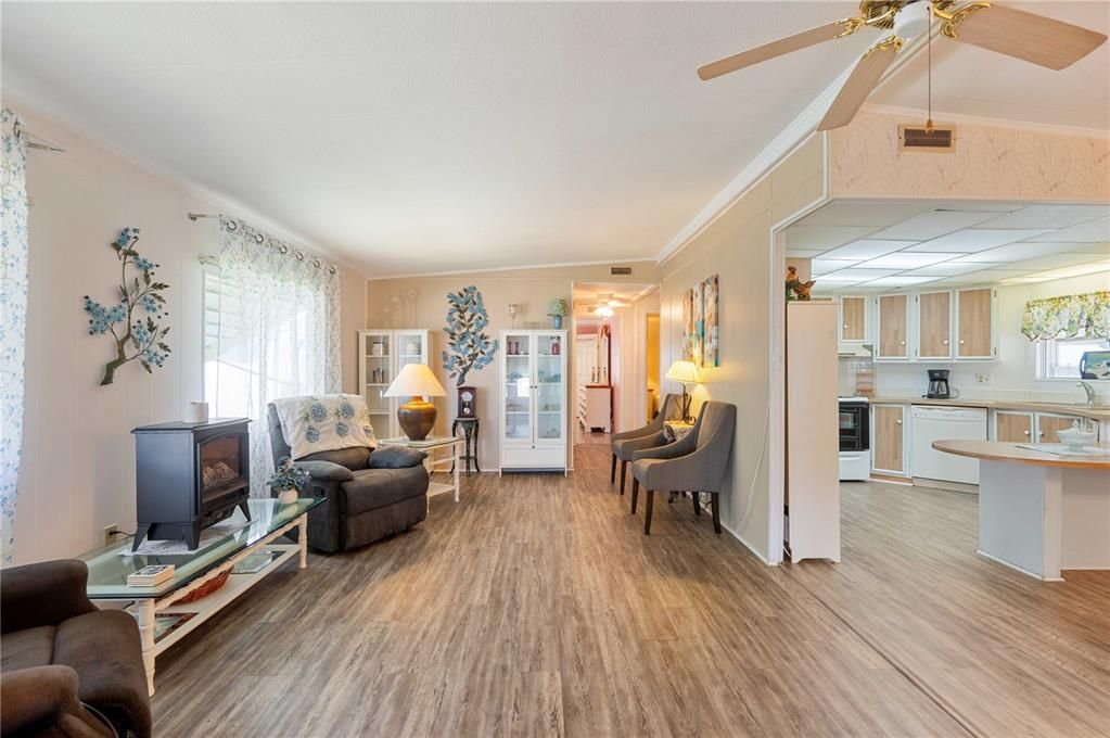 Laminate flooring and ceiling fan in this living room.