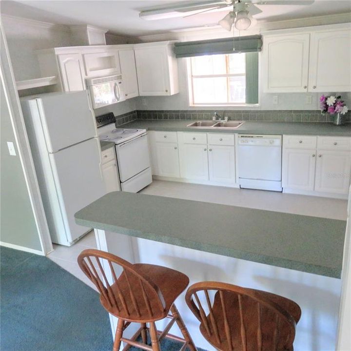 Ceramic tile in the wet areas. Cabinets for plenty of storage.