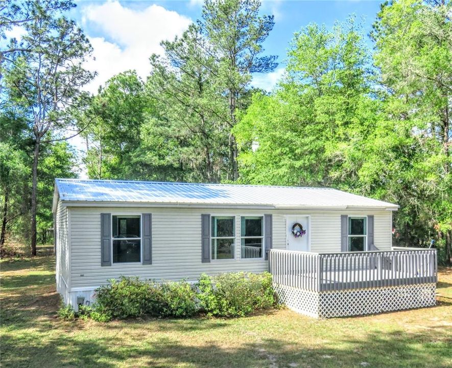 Open floor plan allow for easy living. Added space : Back Screened Porch for year round enjoyment. Front and Back sundecks too. Don't forget the DOCK !