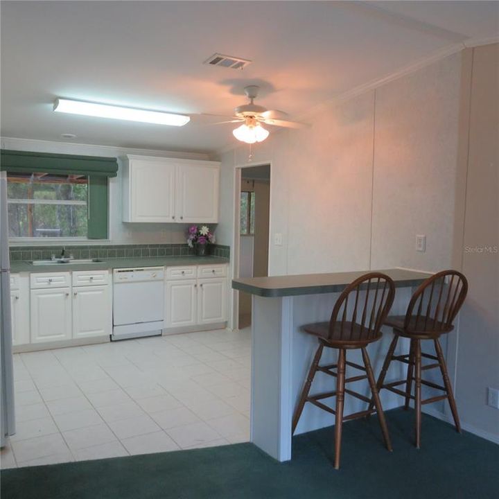 Laundry just off the kitchen, by the back porch for easy timing. Secondary water hook up Want to Add a fridge with ice maker? or room to add a deep freezer.