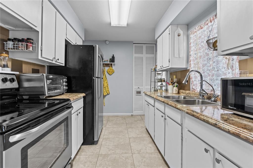 Beautifully updated kitchen with stainless-steel appliances.