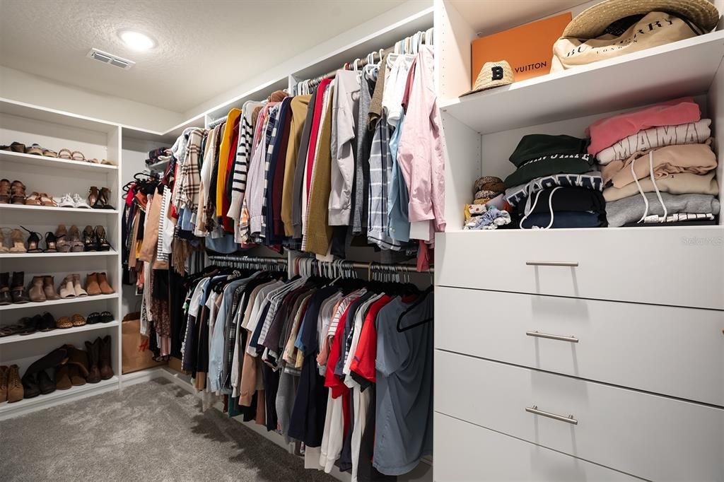 Huge Primary Closet with Built-ins