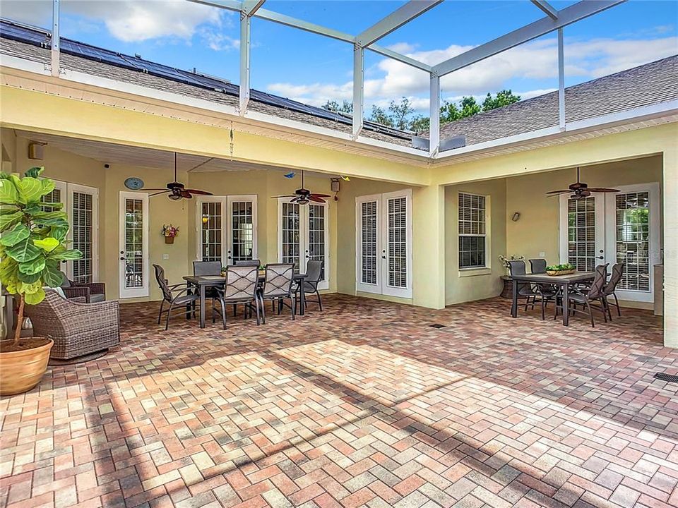 seating & outdoor kitchen view from pool