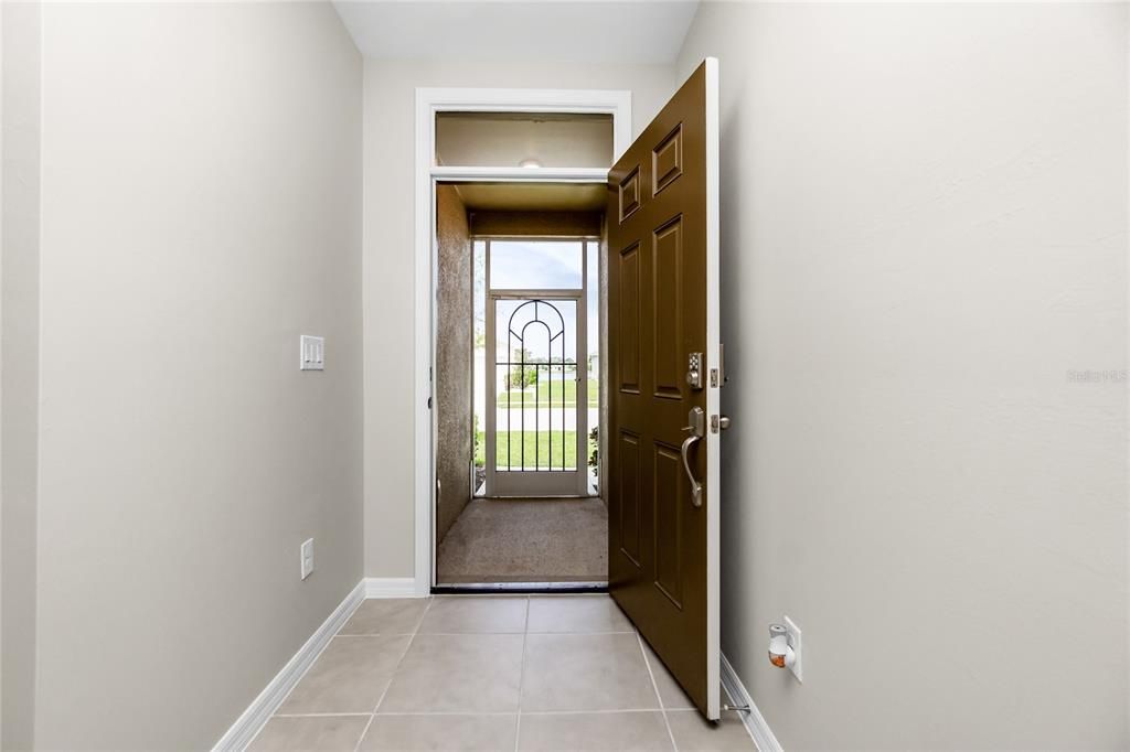 Screened front entry as viewed looking out from your foyer.