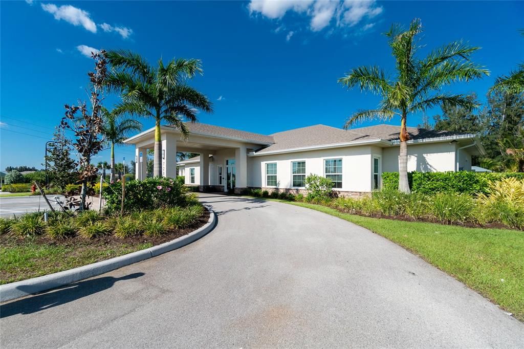 Primary Clubhouse with pool, fitness center, pickleball courts and bocce ball courts.