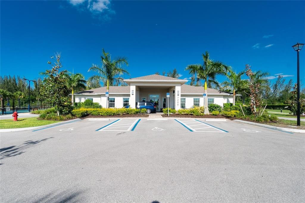 Primary Clubhouse with pool, fitness center, pickleball courts and bocce ball courts.