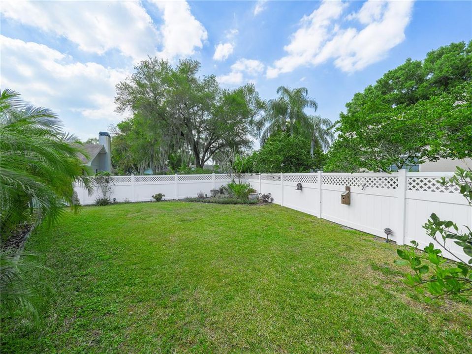 .35 acres vinyl fenced back yard.