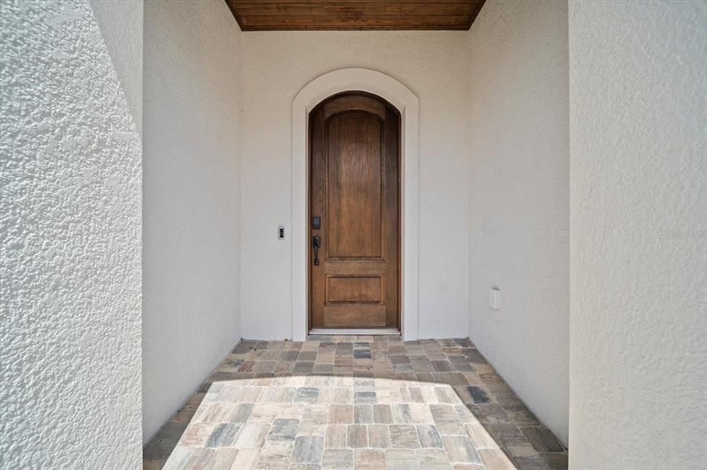 This is a solid wood mahogany door
