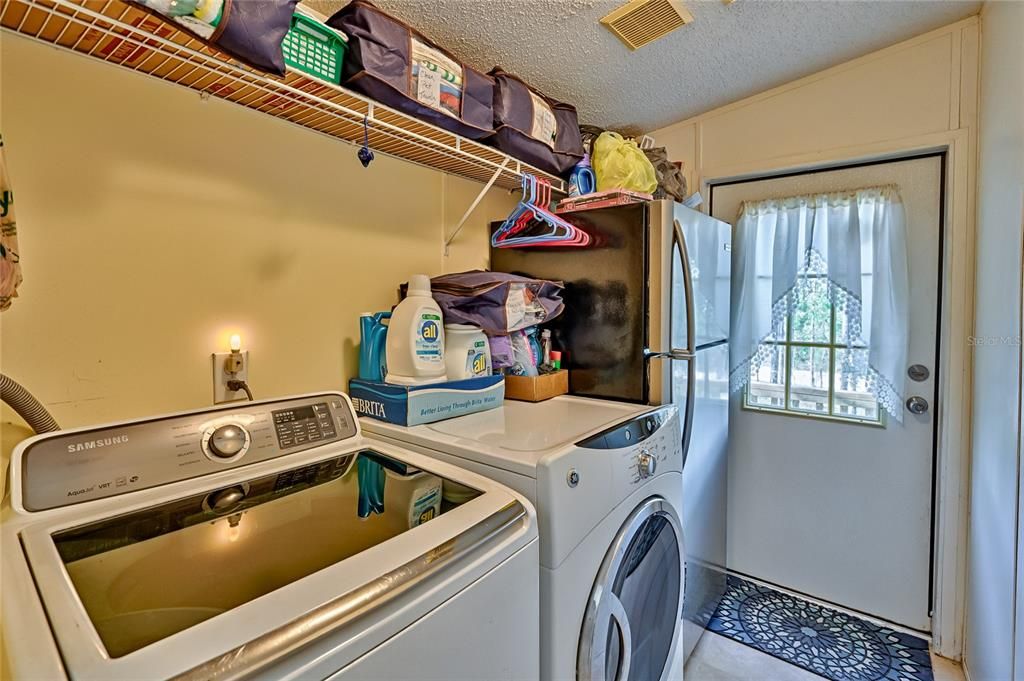 Utility Room with side yard access