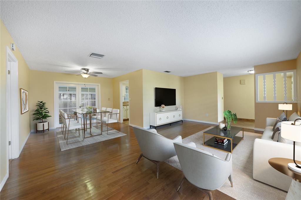 This 2-bedroom, 2-bath split layout has WOOD FLOORS throughout the main living areas as well as the primary suite and easy care TILE FLOORS in the kitchen and bathrooms. Virtually Staged.