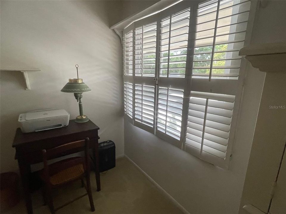 GUEST BEDROOM with WOODEN SHUTTERS