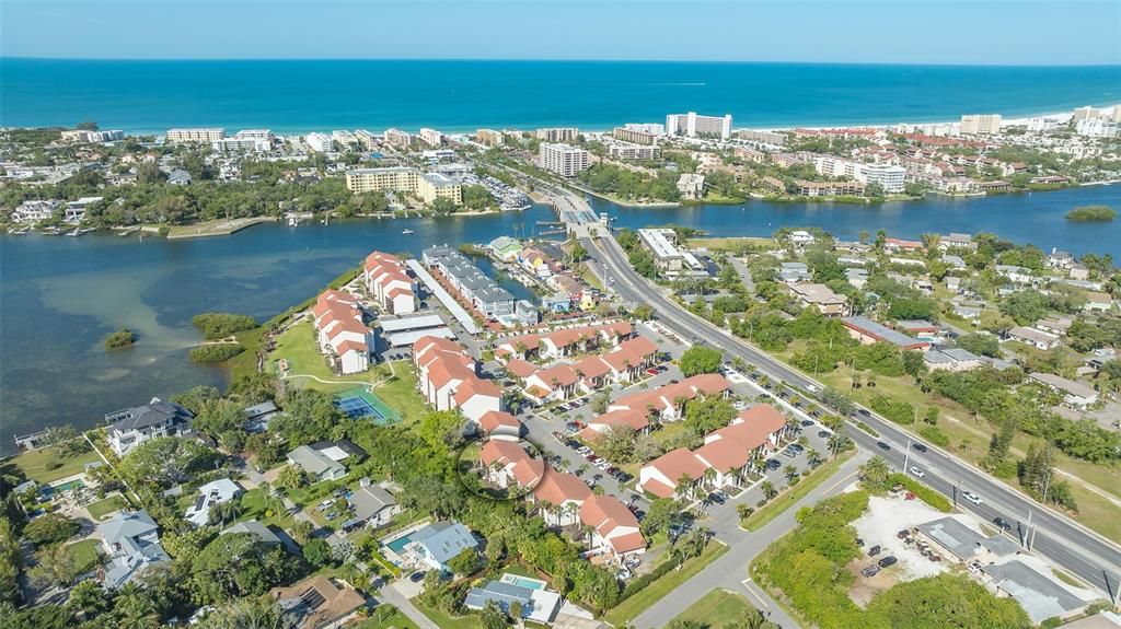 Castel Del Mare is located on the mainland side of Little Sarasota Bay, just across the bridge from Siesta Key.