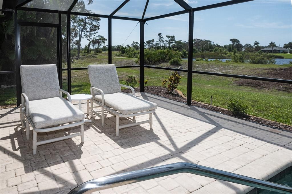 Spacious area for lounging and sunbathing with views of the lake