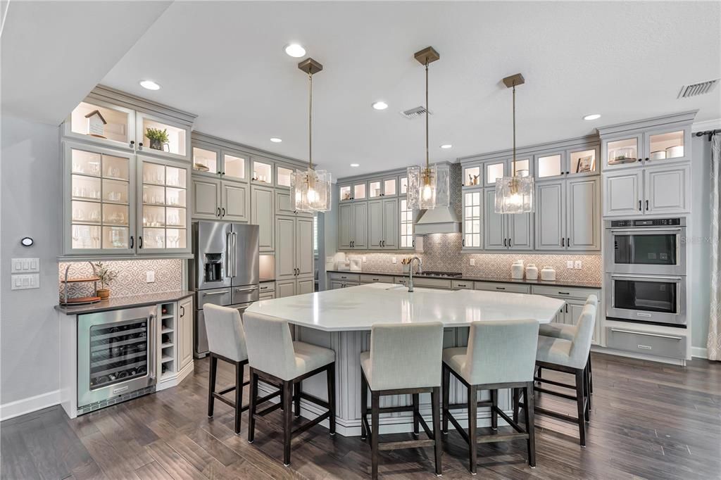 open concept kitchen featuring an extra large Island for entertaining