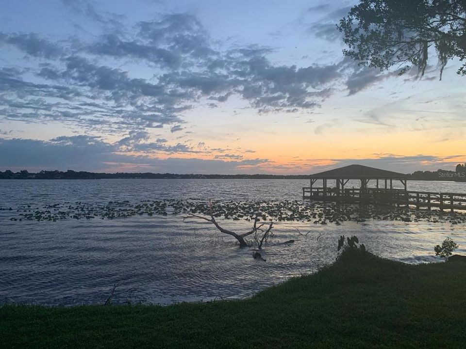 Gorgeous sunsets from the backyard (the dock is the neighbors and not included in the sale)