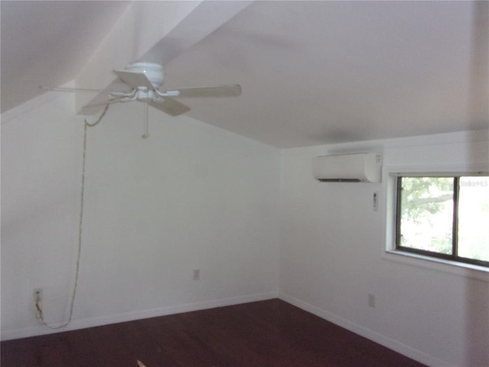 Ceiling fan in the bedroom as well and blinds on the window