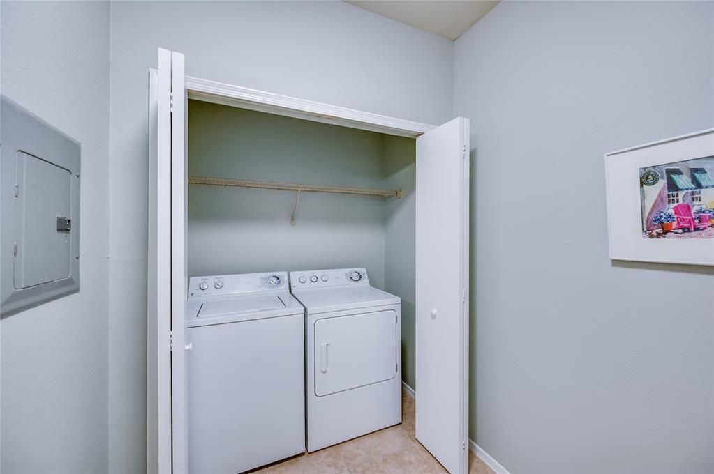 laundry closet with a flex room