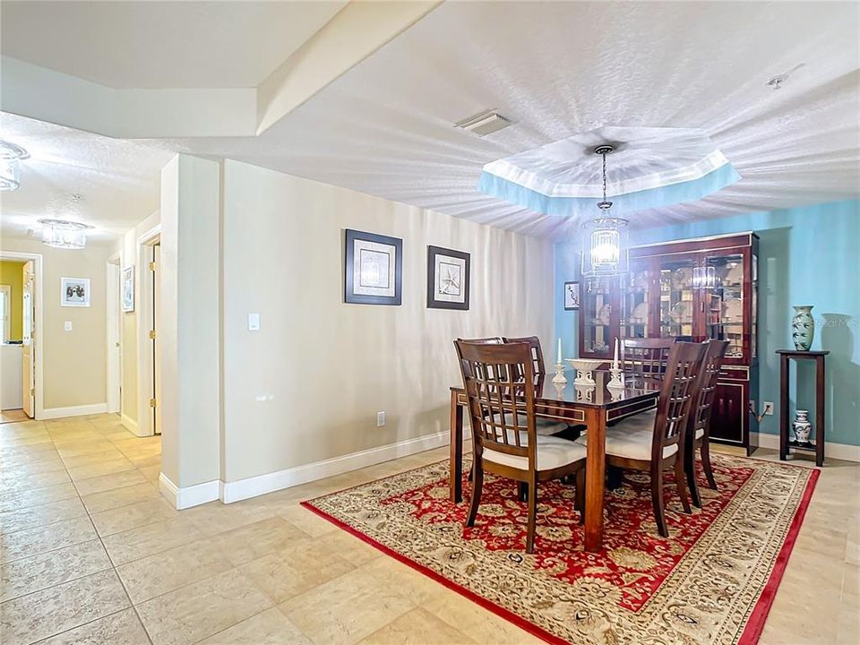 This is a 2nd view of your dining room showing how it can easily fit 6 chairs around the dining table an a full sized china closet.