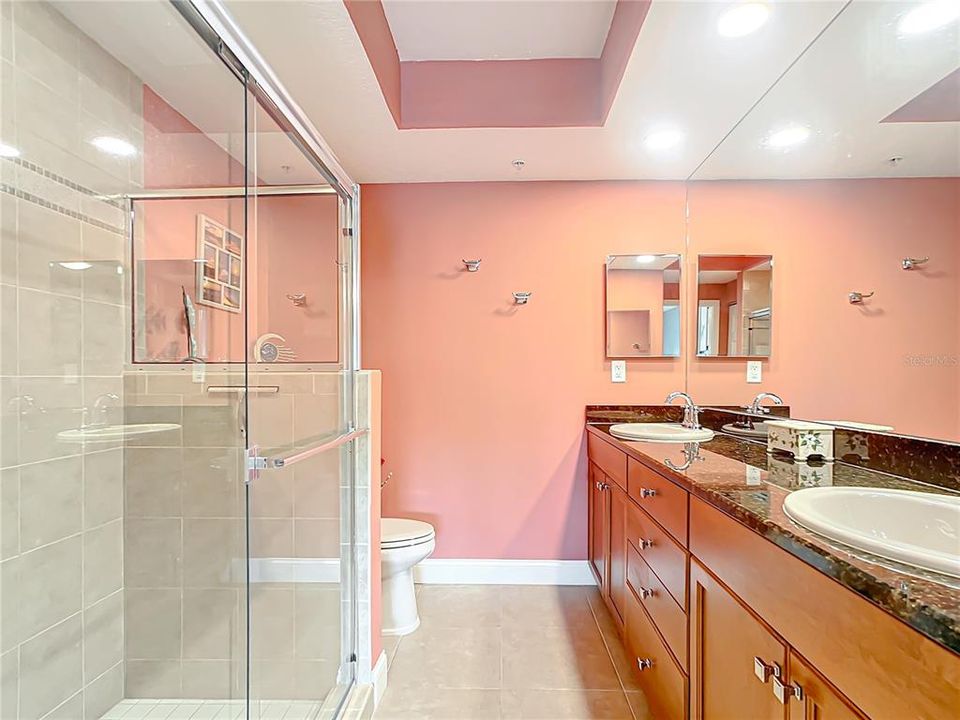 This is the 2nd bathroom that is off of the 2nd bedroom.  Please notice that you have a nice sized shower and double vanities.