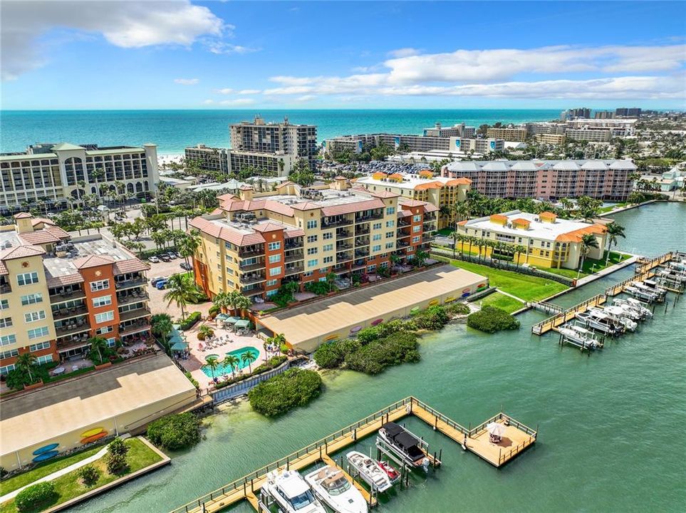 This aerial view shows the 2 buildings at Boca Sands, the north and south.  This unit is in the north building.  Notice the boat slips and the fishing pier.  This also shows the close proximity of the beach & Gulf of Mexico