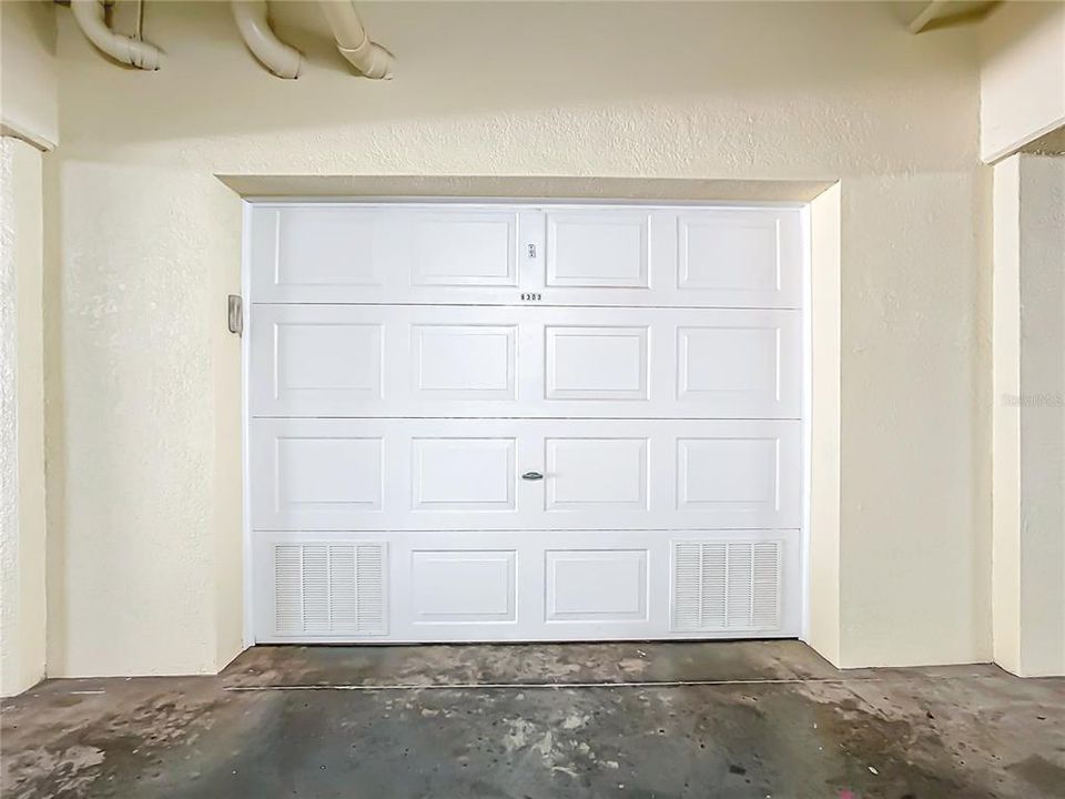 This is the garage that belongs to this unit.  It is large enough for 2 cars parked in tandem.