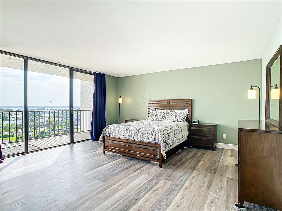 Master bedroom showing second balcony