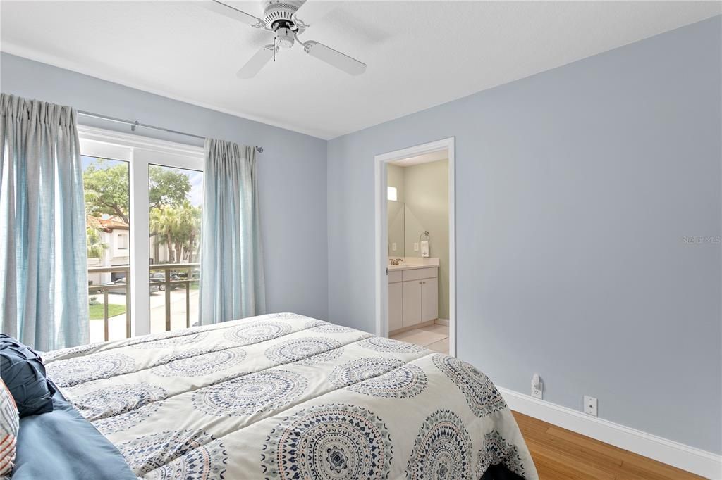 The second bedroom is nicely sized with a sliding glass door and Juliet style balcony and a Jack & Jill bath sits between Bedroom 2 and Bedroom 3.