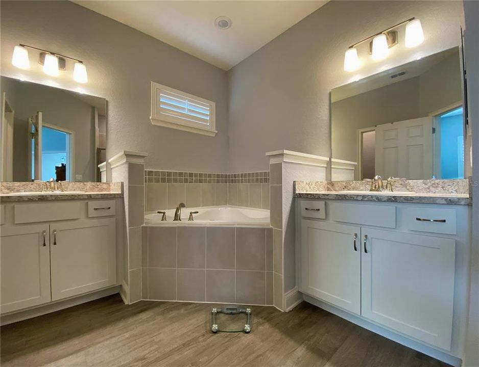 Comfort Height His/Her Separate Vanities with Large Soaking Tub