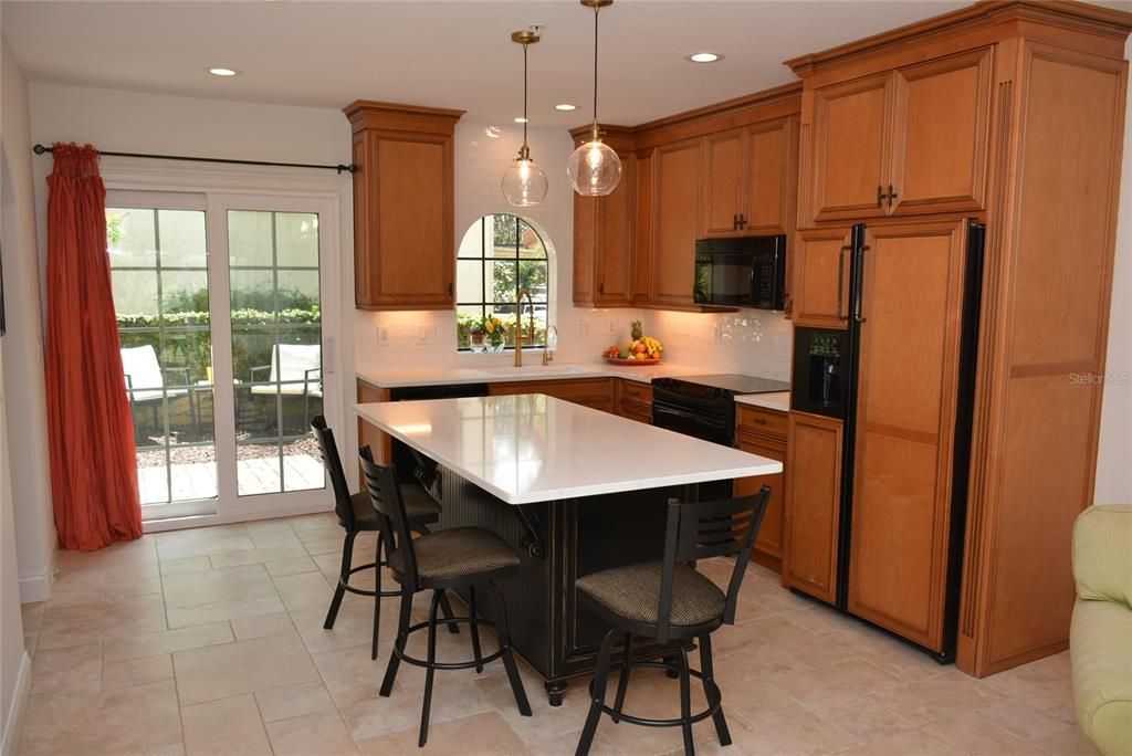 Kitchen has a butler’s pantry, closet pantry and brand new Quartz countertops.  Bar stools can convey with property.