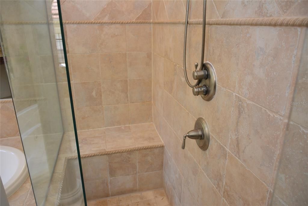 Walk-in shower with built-in seat