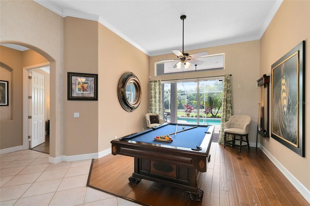 Formal living room is currently used as a recreation room.