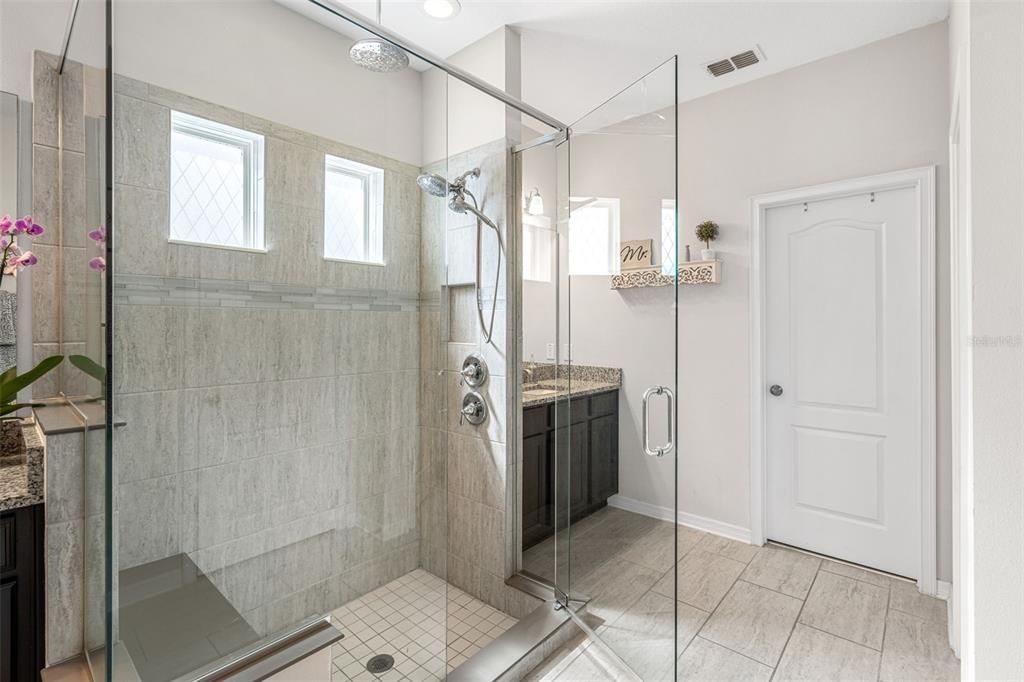 Walk-in shower with built-in bench