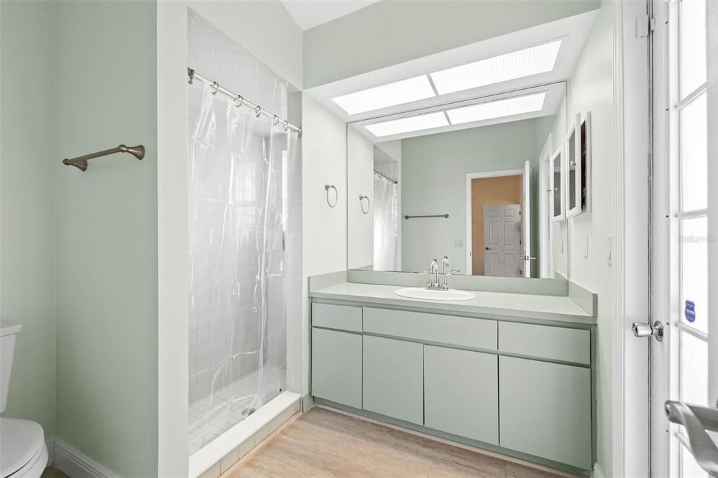Primary ensuite bathroom with walk in shower