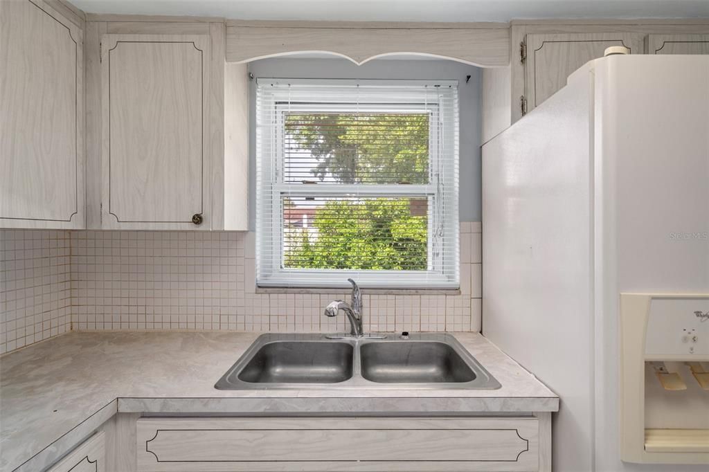 You can enjoy a view of the great outdoors while you wash the dishes