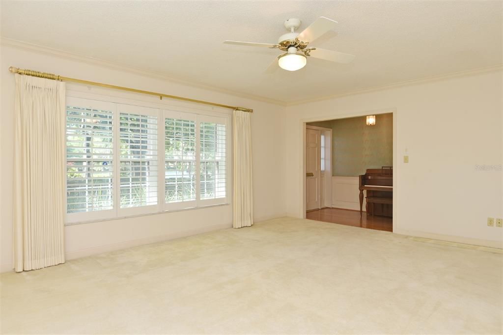 Living Room  w/ views of Lake and Foyer