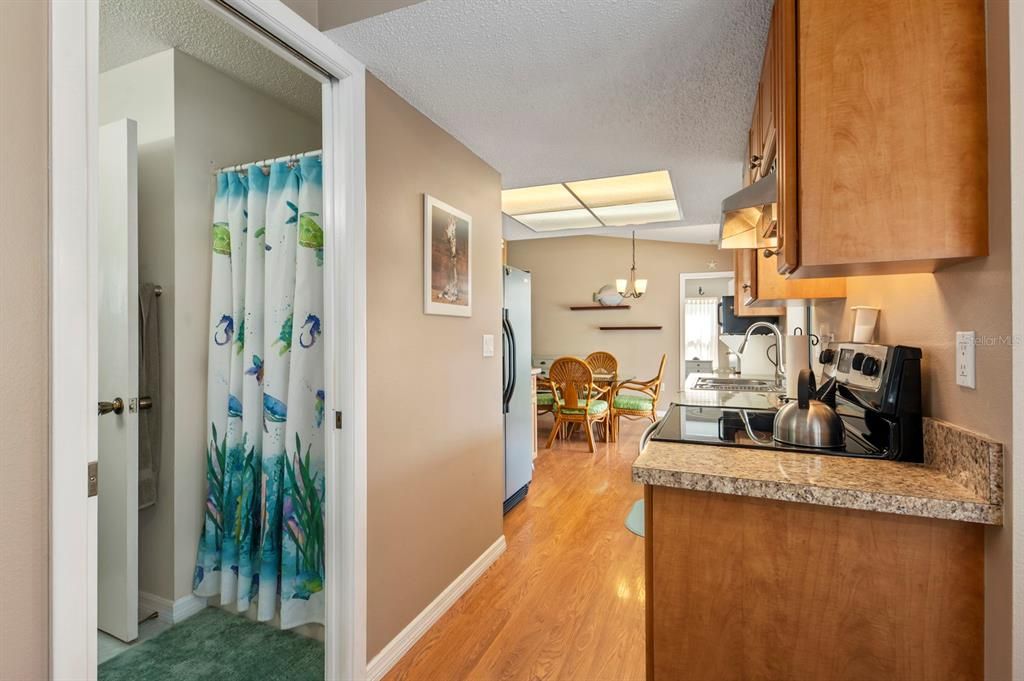 The guest bath on the left leads into the guest bedroom.