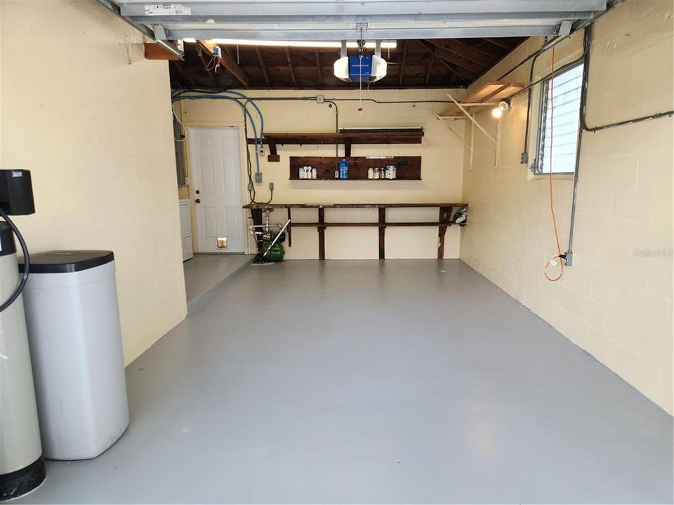 Freshly Painted Garage, work bench and water softner