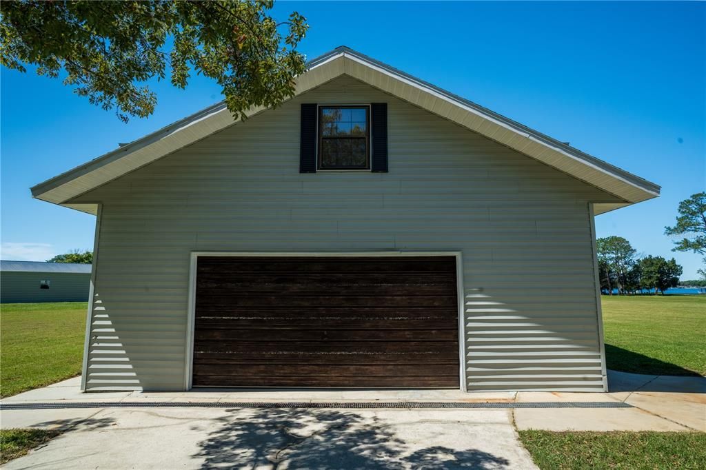 Detached 29x29 air conditioned garage with 220 outlets, tons of storage and potential In-Law Suite above.