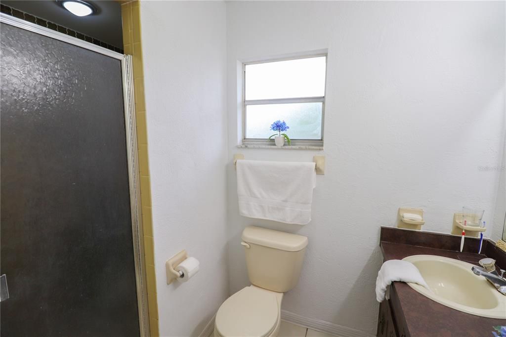 The primary bathroom with shower.