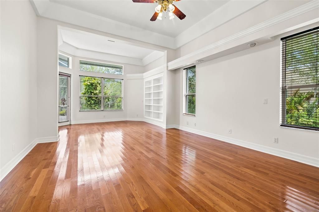 Large Primary bedroom with solid wood floors
