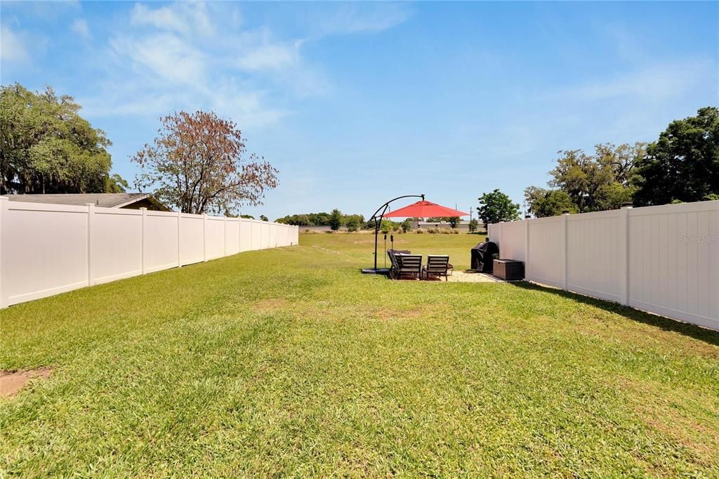 Privacy fence on both sides of property with open views from private patio