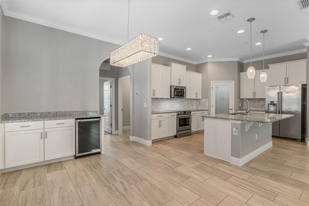 Dining area and bar with wine fridge