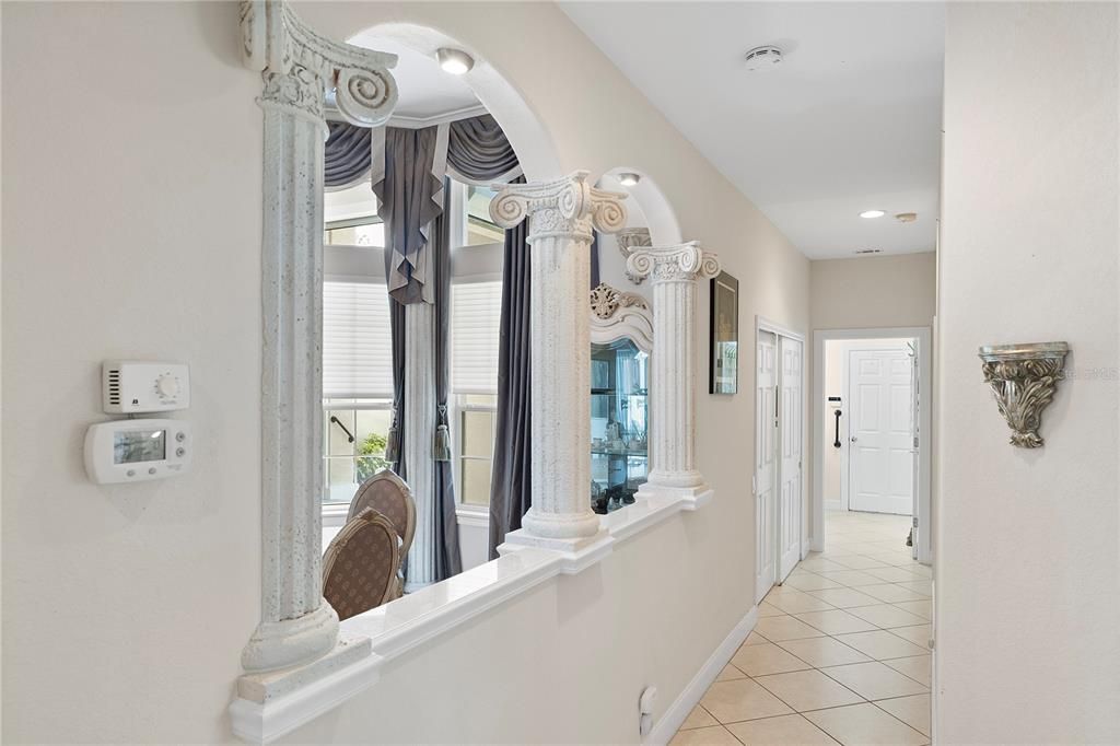 Hall off the dining room, past the bedrooms leading to the laundry room and 3 car garage.