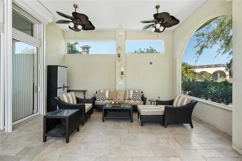 This home comes with hurricane  shutter which also protects the patio.