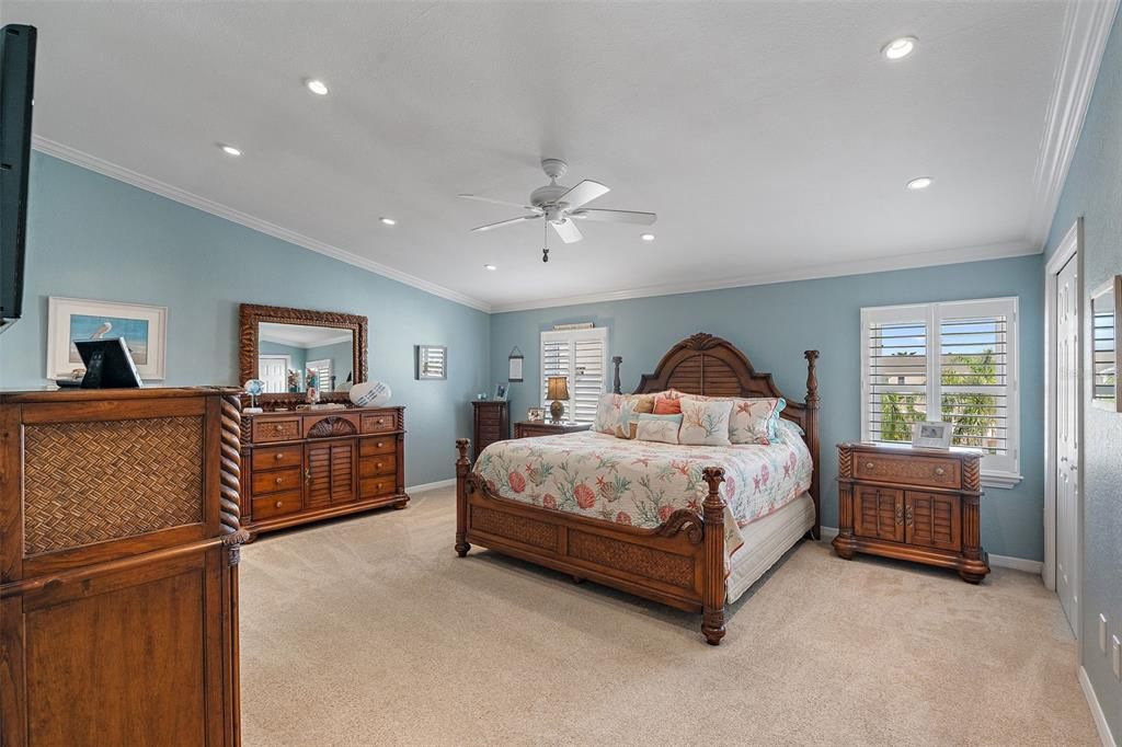 Large primary suite with bath and 3 closets and a linen closet.