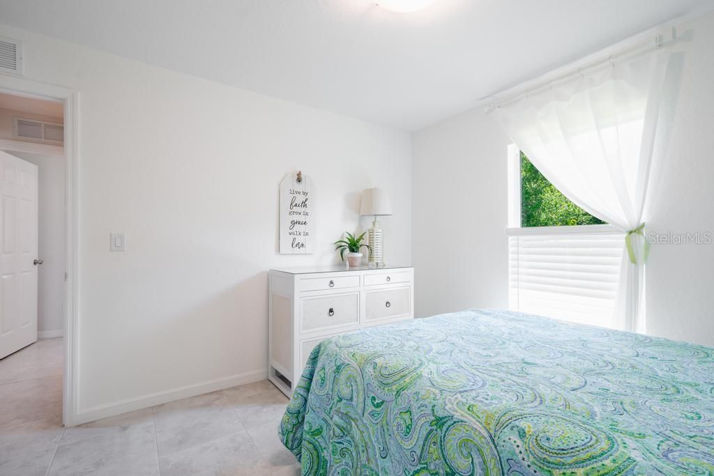 GUEST ROOM: QUEEN SIZE BED is shown