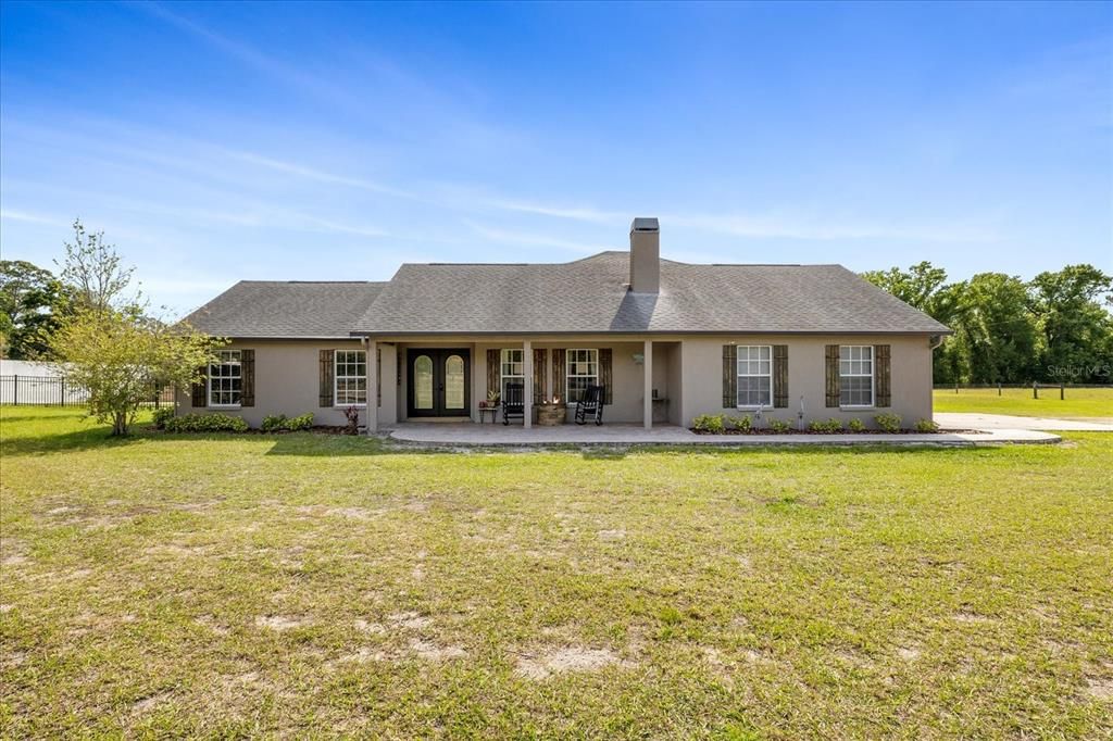 Front of home faces west and into the large pasture to watch the sunsets while your horses happily graze into the evening!