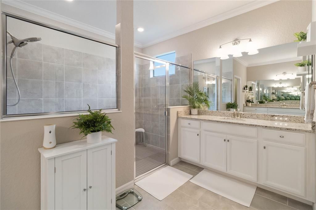 Large Owners Bath with dual vanities, Oversized Shower, Private Water Closet