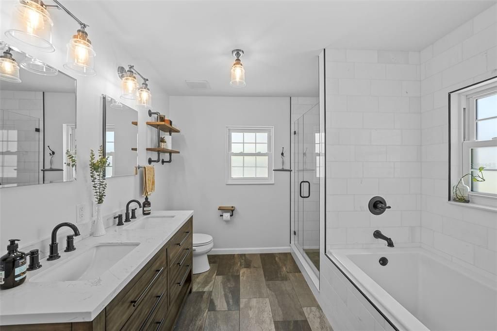 Gorgeous enlarged master bath w marble-finished walk-in shower AND deep garden tub, contemp. tile